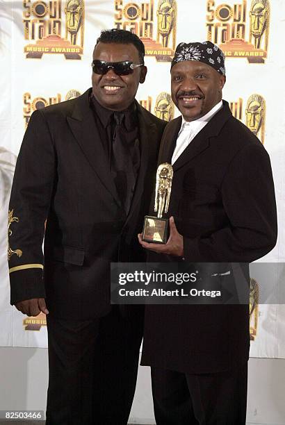 The Isley Brothers, Ron and Ernie with their award for Best R&B Single, Group or Band during the 16th annual Soul Train Awards in Los Angeles March...