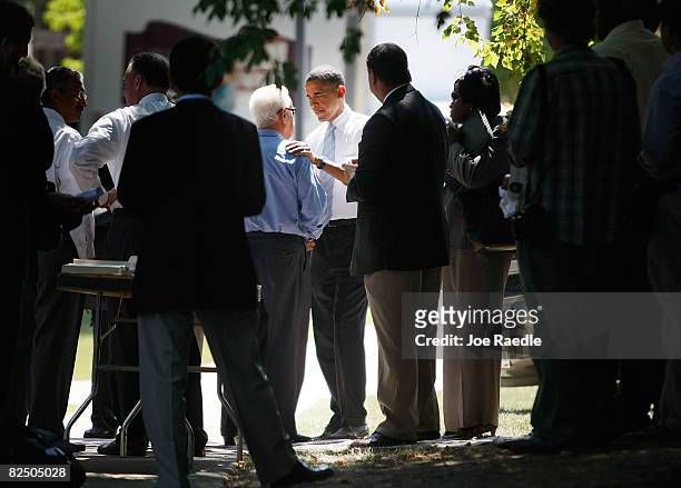 Presumptive Democratic Presidential candidate U.S. Sen. Barack Obama talks with people after a campaign event at John Tyler Community College August...