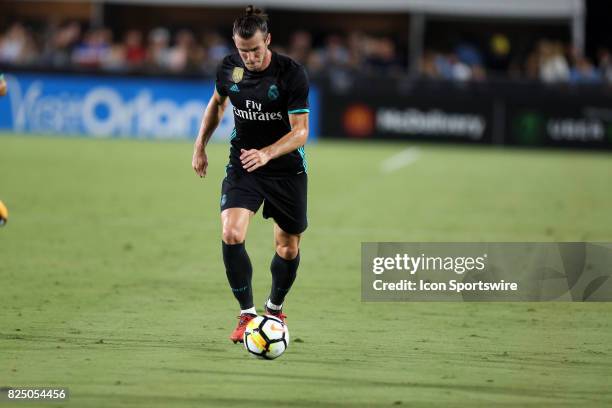 Real Madrid Gareth Bale dribbles up the field during the International Champions Cup match against Real Madrid on July 26 at the Los Angeles Coliseum...