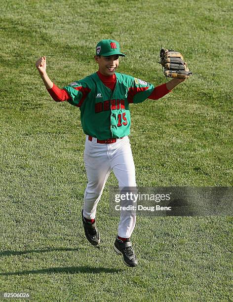 Centerfielder Sergio Rodriguez of Mexico celebrates after his team defeated Latin America during the international semi-final at Lamade Stadium on...