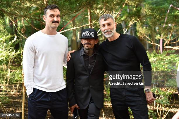 Matthew Carey, Nixon Beltrain and Joseph La Piana attend The 24th Annual Watermill Center Summer Benefit & Auction at The Watermill Center on July...