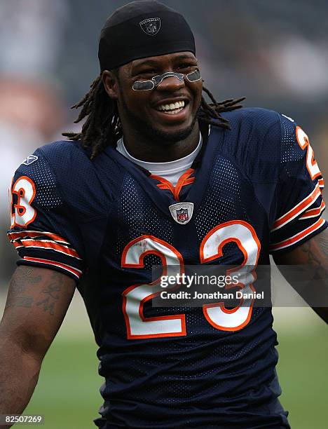 Devin Hester of the Chicago Bears smiles at teammates during warm-ups before a game against the San Francisco 49ers on August 21, 2008 at Soldier...