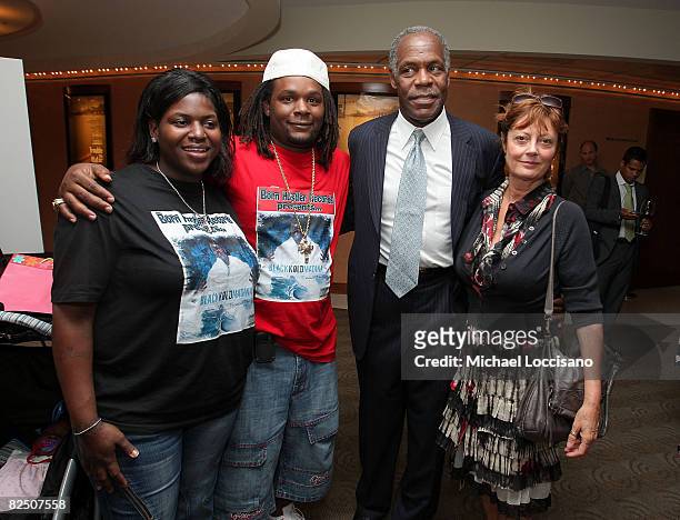 Husband and wife and film subjects Kimberly Rivers Roberts and Scott Roberts, co-producer and actor Danny Glover and actress Susan Sarandon attend...