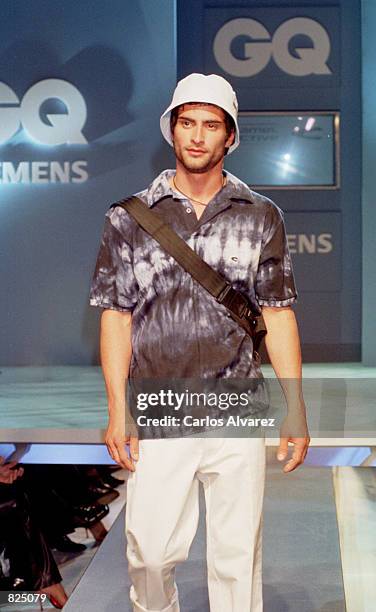Fashion model wears an outfit from the Camel Active Spring/Summer collection 2001 during the GQ fashion party May 7, 2001 in Madrid, Spain.