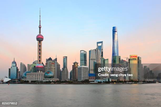 pudong skyline from the bund, shanghai, china, asia - view into land stock pictures, royalty-free photos & images