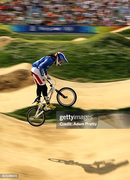 Anne-Caroline Chausson of France competes in the Women's BMX semifinals held at the Laoshan Bicycle Moto Cross Venue during Day 14 of the Beijing...