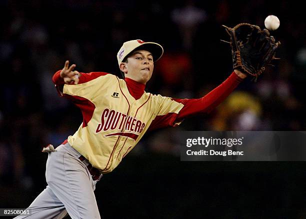 Third baseman Wyatt Reid of the Southeast reaches out to snag a line-drive while taking on the Southwest during the United States semi-final at...
