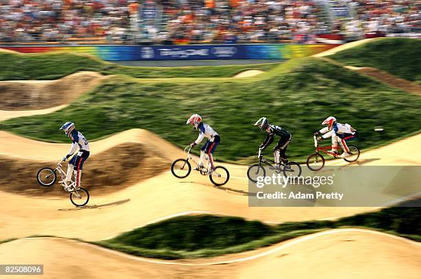 Jill Kintner of the United States leads in the Women's BMX semifinals held at the Laoshan Bicycle Moto Cross Venue during Day 14 of the Beijing 2008...