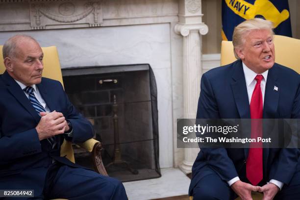 New White House Chief of Staff John Kelly and President Donald Trump talk after being privately sworn in during a ceremony in the Oval Office of the...