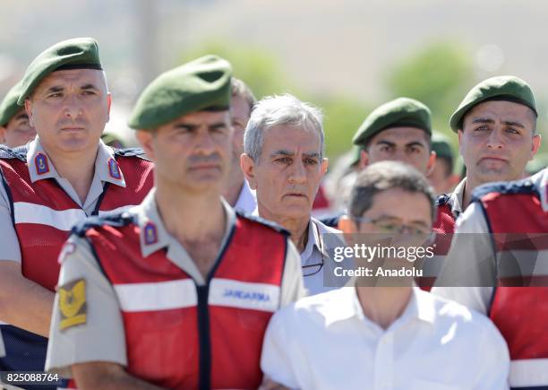 Defendant Kemal Batmaz and Akin Ozturk arrive for their trial accompanied with gendarmerie commandos of Sincan Penal Institution at Ankara 4th Heavy...