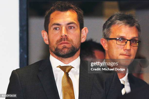 Hawthorn Hawks player Luke Hodge arrives ahead of the AFL Tribunal hearing into his striking charge at AFL House on August 1, 2017 in Melbourne,...