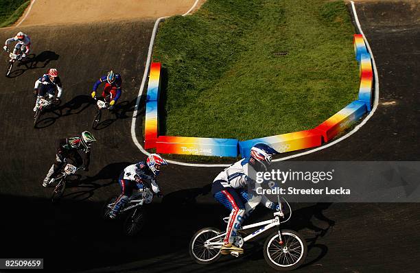 Mike Day and Donny Robinson of the United States compete in the Men's BMX semifinal held at the Laoshan Bicycle Moto Cross Venue during Day 14 of the...