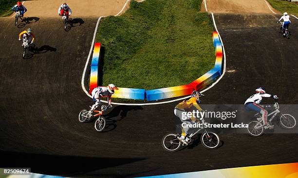 Lieke Klaus of the Netherlands, Nicole Callisto of Australia and Shanaze Reade of Great Britain compete in the Women's BMX semifinal run held at the...