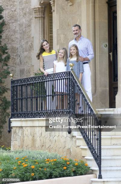 Queen Letizia of Spain, Princess Leonor of Spain , Princess Sofia of Spain and King Felipe VI of Spain pose for the photographers during the summer...