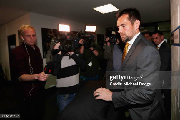 Hawthorn Hawks player Luke Hodge leaves the AFL Tribunal hearing into his striking charge at AFL House on August 1, 2017 in Melbourne, Australia.