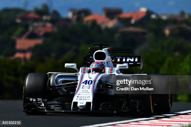 Paul di Resta of Great Britain driving the Williams Martini Racing Williams FW40 Mercedes on track during the Formula One Grand Prix of Hungary at...