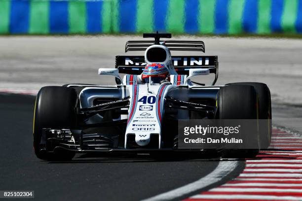 Paul di Resta of Great Britain driving the Williams Martini Racing Williams FW40 Mercedes on track during the Formula One Grand Prix of Hungary at...