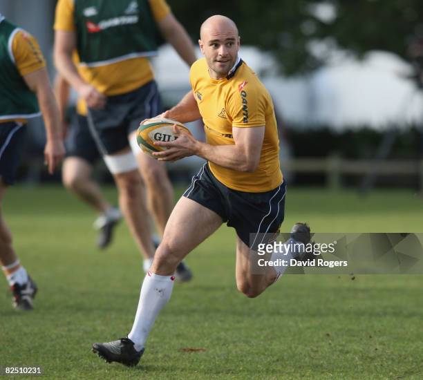Sam Cordingley, the Wallaby scrumhalf runs with the ball during the Australian Wallabies training session held at Bishops School on August 22, 2008...