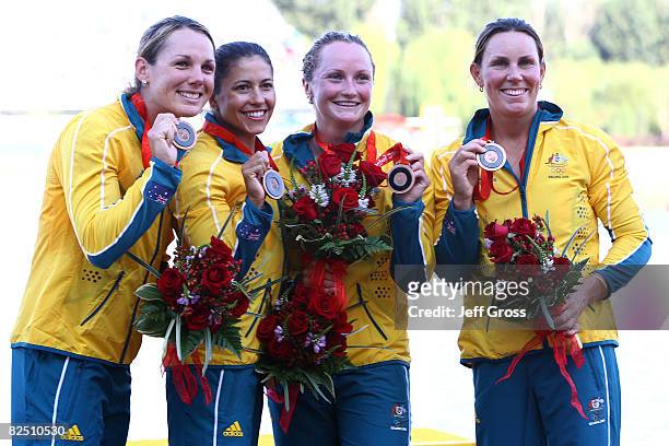 Lisa Oldenhof, Hannah Davis, Chantal Meek and Lyndsie Fogarty of Australia celebrate after winning the bronze medal in the Kayak Four 500m Women...