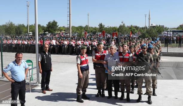 Defendant Akin Ozturk and other defendants are accompanied by gendarmerie as they arrive for their trial at Sincan Penal Institution at the 4th Heavy...