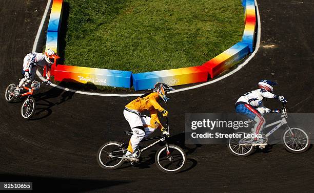 Lieke Klaus of the Netherlands, Nicole Callisto of Australia and Shanaze Reade of Great Britain compete in the Women's BMX semifinal run held at the...