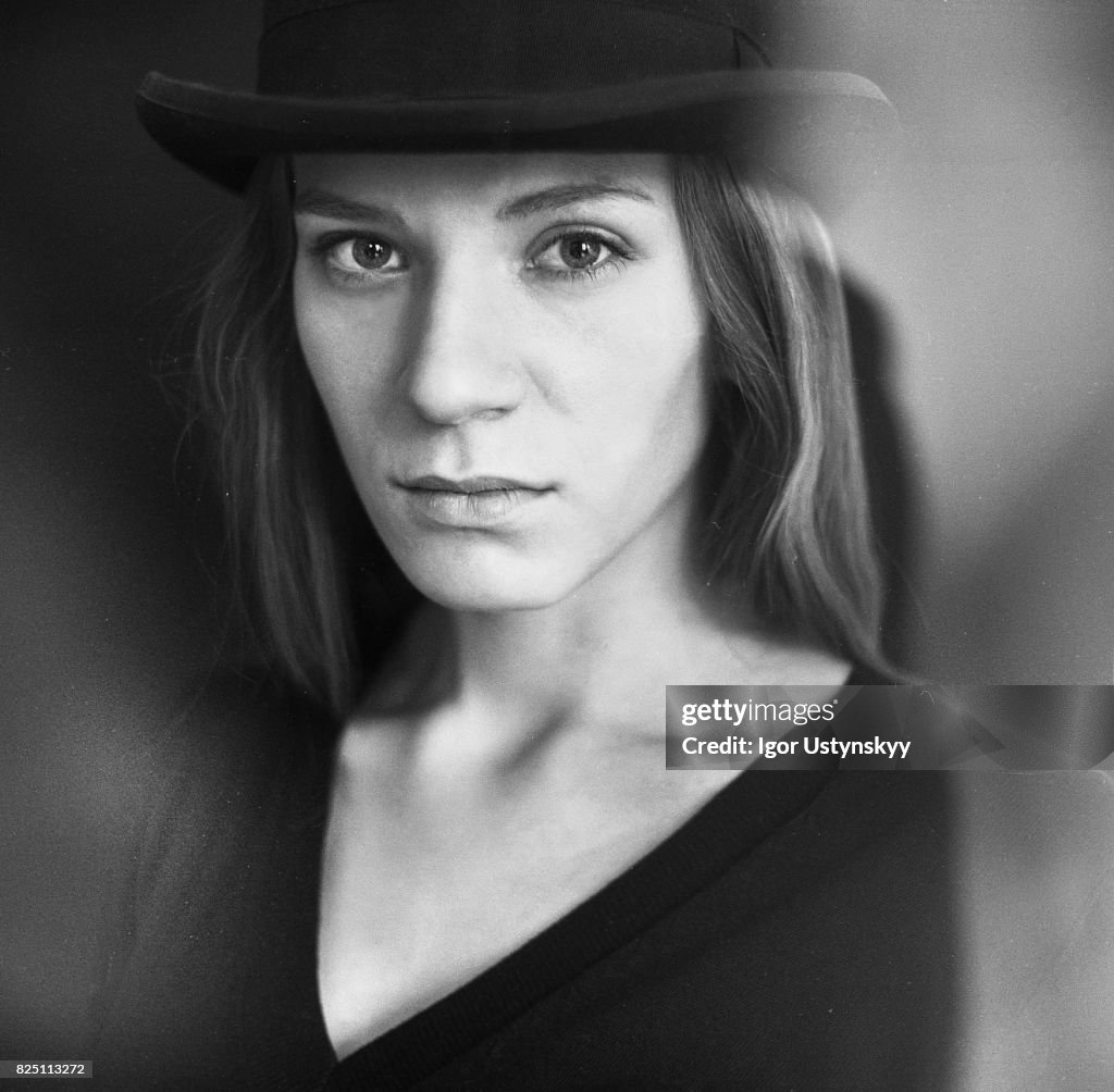 Black and white portrait of woman on the grey background