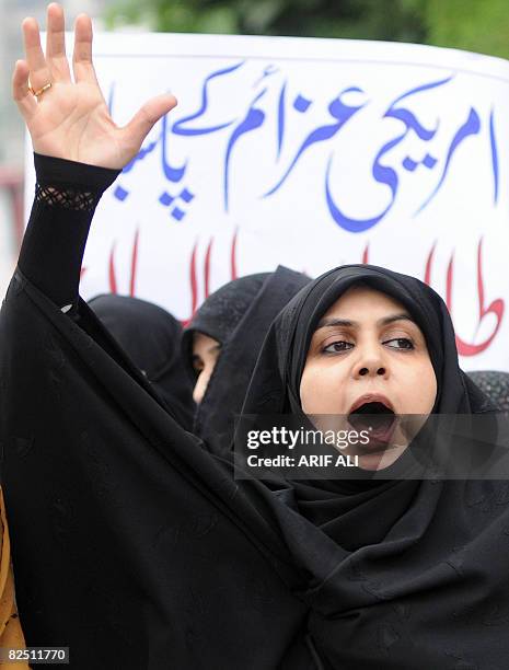 Pakistani Muslim women protest in Lahore on August 22, 2008 against the suicide attack at the hospital in Dera Ismail Khan. A suicide bomber blew...