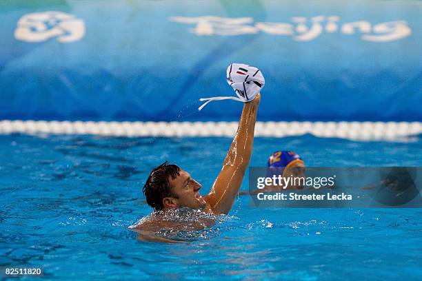 Gabor Kis of Hungary celebrates Hungary's 11-9 win against Montenegro during a semifinal game of the water polo event at the Ying Tung Natatorium on...