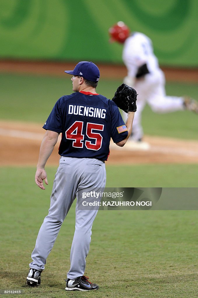 US pitcher Brian Duensing stands on the