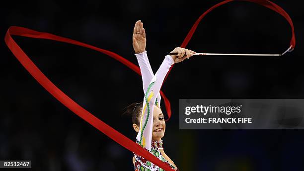 Ukraine's Ganna Bessonova competes in the individual all-around qualification of the rhythmic gymnastics at the Beijing 2008 Olympic Games in Beijing...