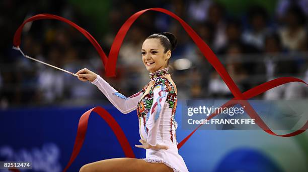 Ukraine's Ganna Bessonova competes in the individual all-around qualification of the rhythmic gymnastics at the Beijing 2008 Olympic Games in Beijing...
