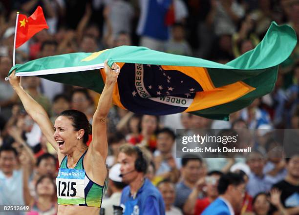 Maurren Higa Maggi of Brazil celerates after her victory in the Women's Long Jump Final at the National Stadium on Day 14 of the Beijing 2008 Olympic...