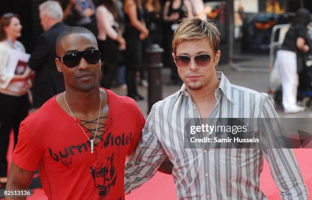 Simon Webbe and Duncan James of boy band Blue arrive at the European Premiere of the new Batman film, 'The Dark Knight' on July 21, 2008 at the Odeon...