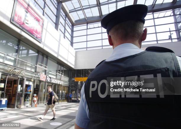 Policeman patrols at the Suedkreuz train station on August 1, 2017 in Berlin, Germany. German federal police have started a six-month test at the...