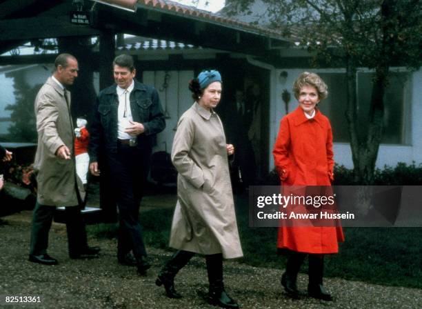 Queen Elizabeth II And Prince Philip pose with President Ronald Reagan And First Lady Nancy Reagan on March 3, 1983 at Their Mountain Top Getaway,...