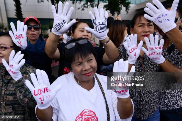 Supporters of ousted former Thai Prime Minister Yingluck Shinawatra waiting for her arrival at the Supreme Court in Bangkok, Thailand on August 1,...