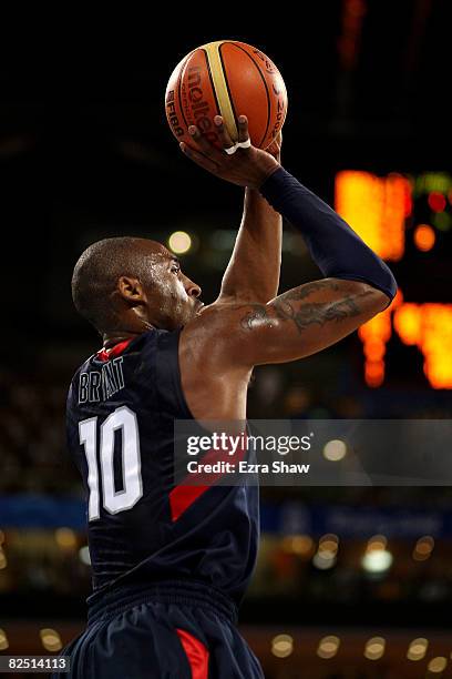 Kobe Bryant of the United States shoots a jumper while taking on Argentina during a men's semifinal baketball game at the Wukesong Indoor Stadium on...