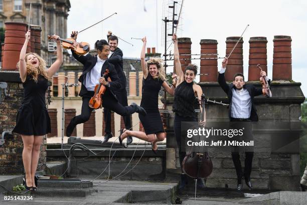 Members of the Catalonian string orchestra Orquestra de Cambra d'Emporda pose on August 1, 2017 in Edinburgh, Scotland. Performing at the Assembly...