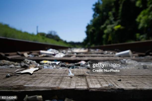 Used syringe found between piles of trash at the heroin camp located under the North Second Street overpass, in the Kensington Section of...