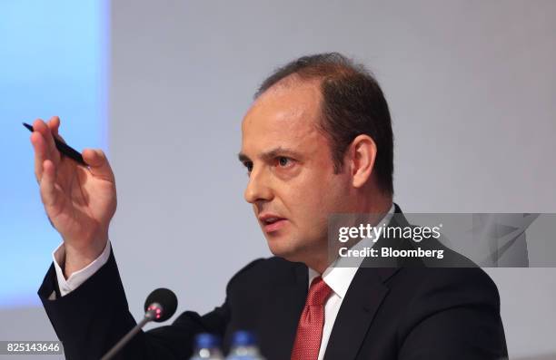 Murat Cetinkaya, governor of Turkey's central bank, gestures as he speaks during a news conference in Ankara, Turkey, on Tuesday, Aug. 1, 2017....