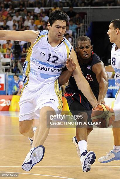 Argentina's Leonardo Gutierrez vies with USA's Paul Chris during the men's semi-final basketball match Argentina against The US of the Beijing 2008...