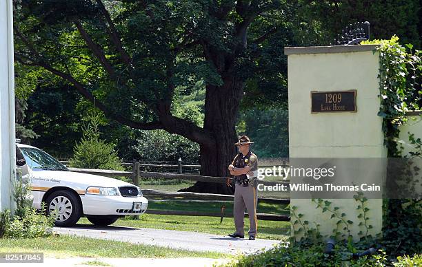 New Castle County Police officer stands guard as media members camp out in front of Delaware Senator Joe Biden's home 2008 in Greenville, Delaware....