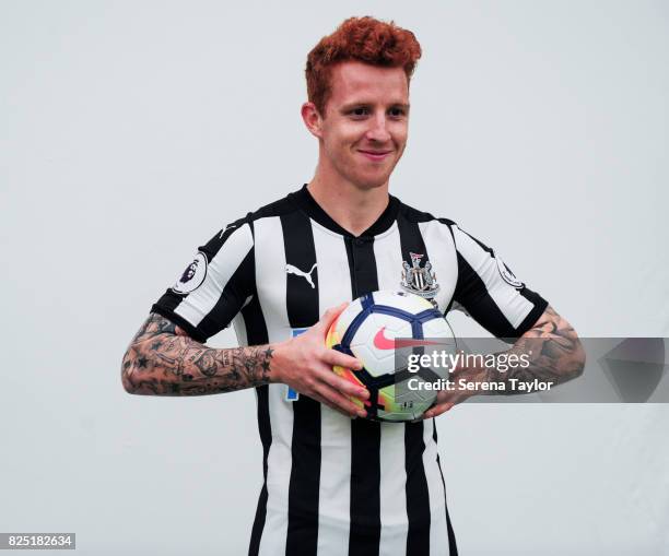 Jack Colback holds a ball during the Newcastle United Media Photo Call Day at the Newcastle United Training ground on July 31 in Newcastle upon Tyne,...