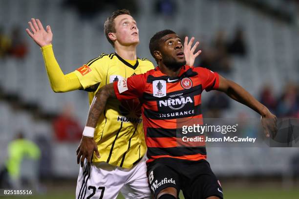 Roly Bonevacia of the Wanderers is challenged by Liam Wood of the Phoenix during the FFA Cup round of 32 match between the Western Sydney Wanderers...