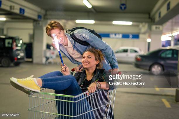 wild and free - man pushing cart fun play stock pictures, royalty-free photos & images