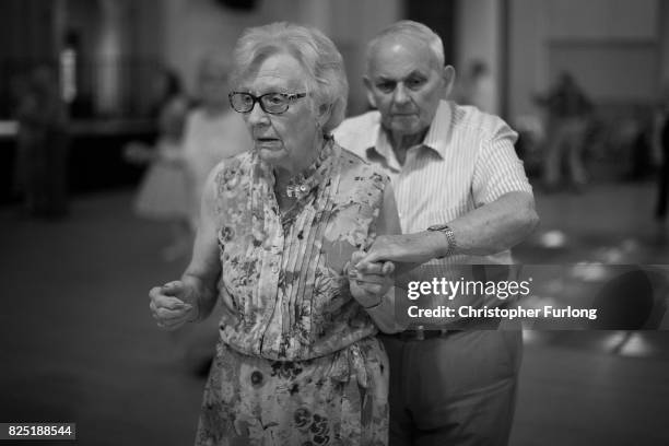 People take part in a tea dance at Sheffield's City hall on August 1, 2017 in Sheffield, England. The popular tea dance session coincides with the...