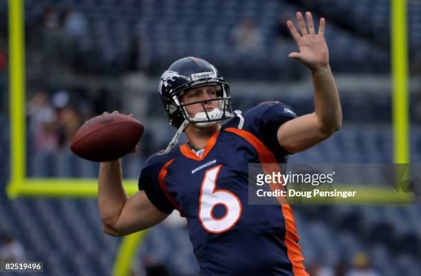 Quarterback Jay Cutler of the Denver Broncos warms up prior to facing the Green Bay Packers during NFL preseason action at Invesco Field on August...