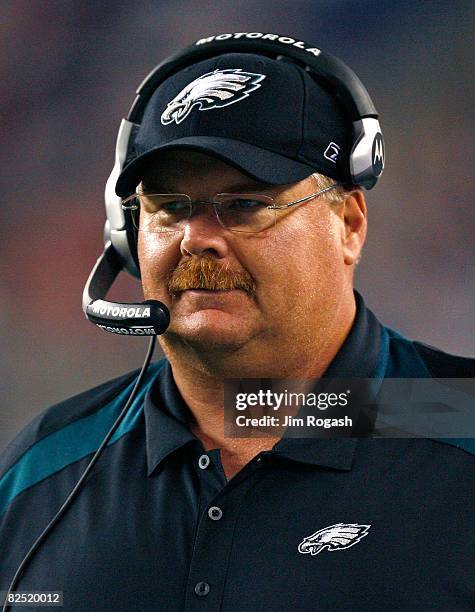 Andy Reid of the Philadelphia Eagles smiles during a preseason game against the New England Patriots at Gillette Stadium on August 22, 2008 in...