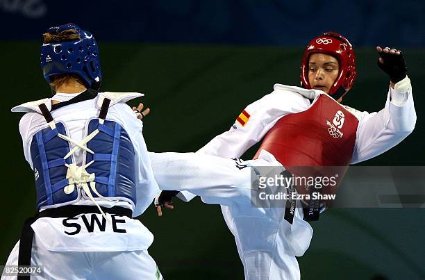 Karolina Kedzierska of Sweden fights Rosana Simon of Spain in the Women +67kg Prelimininary Round of 16 held at the University of Science and...