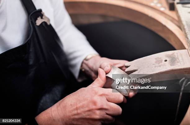 Bangle Maker 467 Bangle Maker Stock Photos, High-Res Pictures, and Images - Getty Images